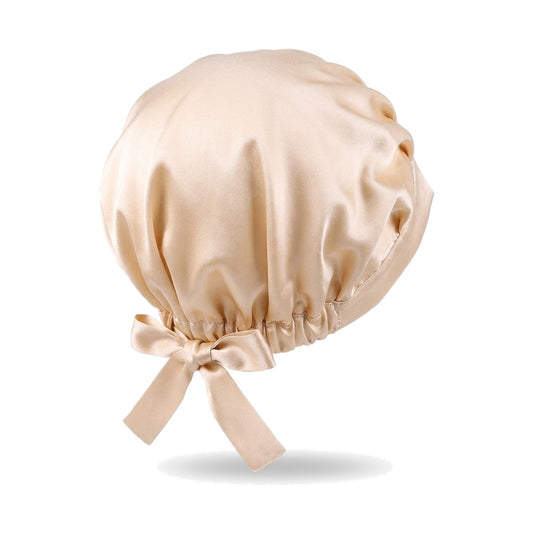 Bonnet de nuit en soie de mûrier champagne, ruban noué à l'arrière, sur fond blanc