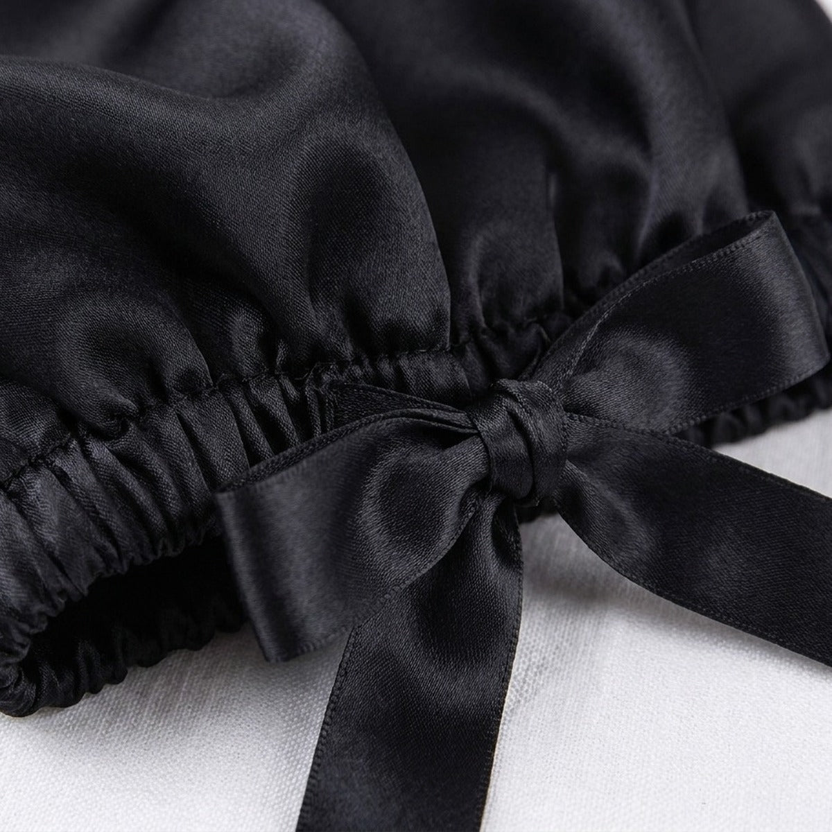 Détail : bord élastique froncé et ruban de satin, coloris noir