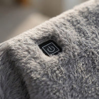 Détail : peluche à poils longs et bouton de chauffe