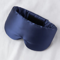 Détail : soie satinée et bande scratch à l'intérieur du bandeau, coloris marine