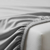 Drap housse jersey SleepFit™ — détail tissu élastique
