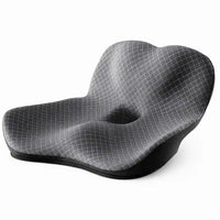 Coussin d'assise gris profilé avec ouverture centrale, vue oblique