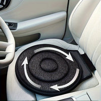 Coussin d'assise pivotant noir posé sur un siège de voiture