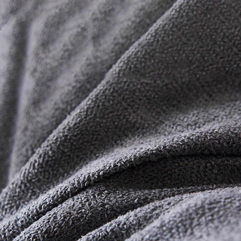 Détail du tissu au toucher velours du coussin dossier de lecture