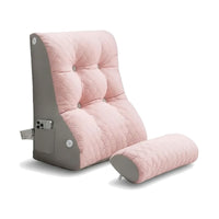 Coussin de lecture pour lit rose seul sur fond blanc