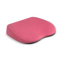 Coussin rehausseur voiture rose seul sur fond blanc
