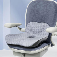 Coussin d'assise gris profilé installé sur une chaise de bureau