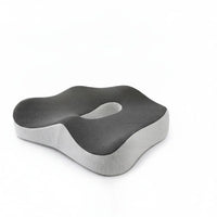 Coussin d’assise gris ErgoCore à découpe arrière, vue de trois quarts
