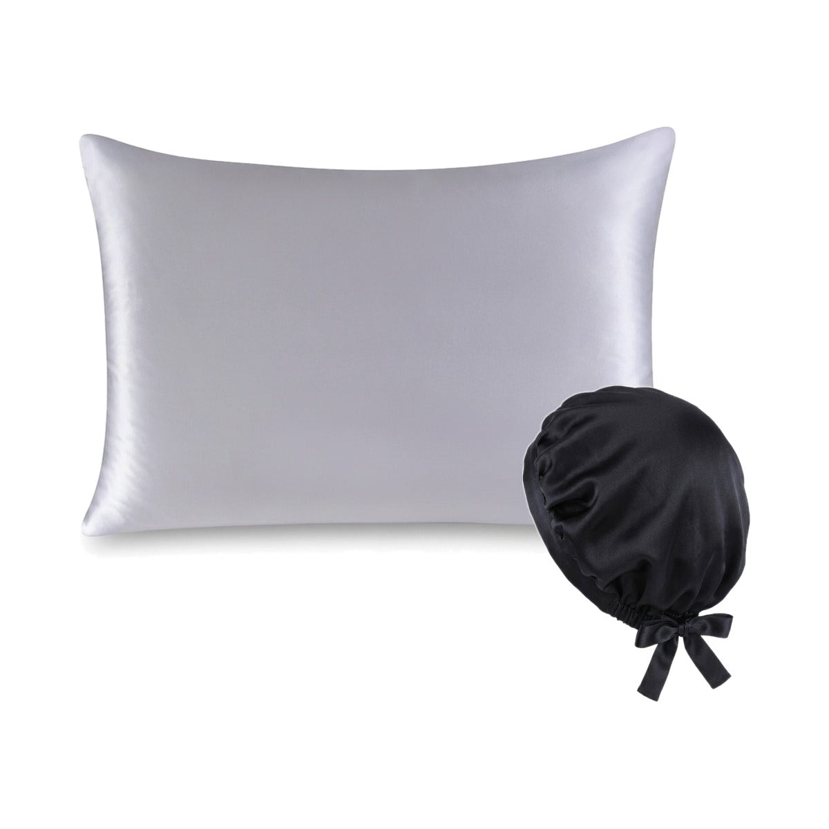 Pack soie de mûrier : taie d'oreiller argent et bonnet de nuit noir, sur fond blanc