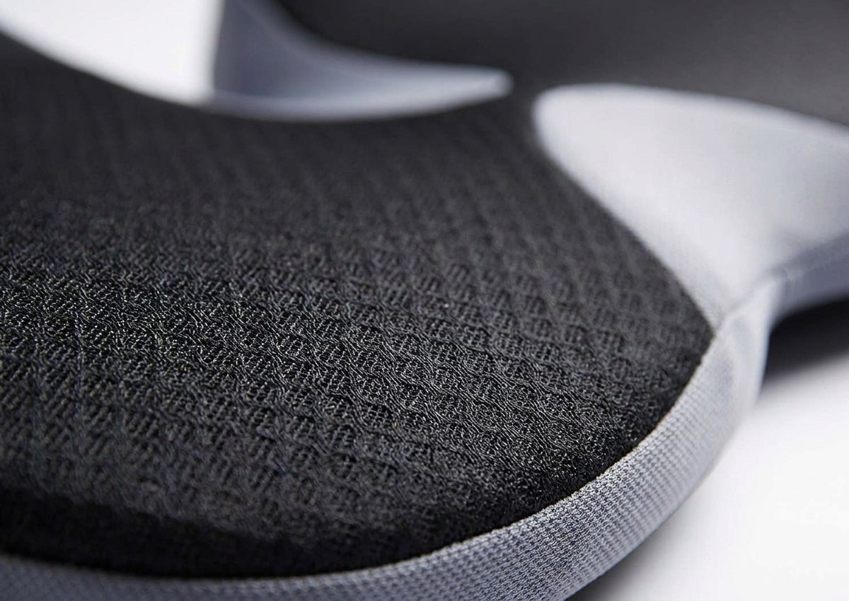 Gros plan sur le tissu respirant du coussin à double ouverture