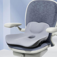 Coussin d'assise gris profilé installé sur une chaise de bureau