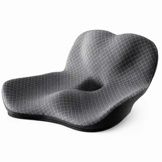 Coussin d'assise gris profilé avec ouverture centrale, vue oblique