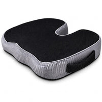 Coussin d’assise VibraSorb noir et gris avec poignée sur fond blanc